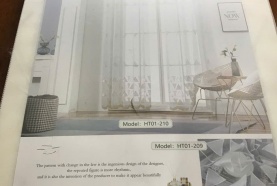 Vải voal (sheer fabric) thêu họa tiết nổi.